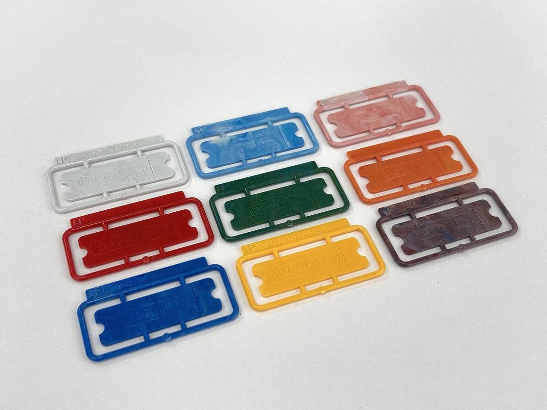 当日配布する「リンプラマークミニプラ」の試作品（当日はボールチェーンと一緒に配布する予定）
