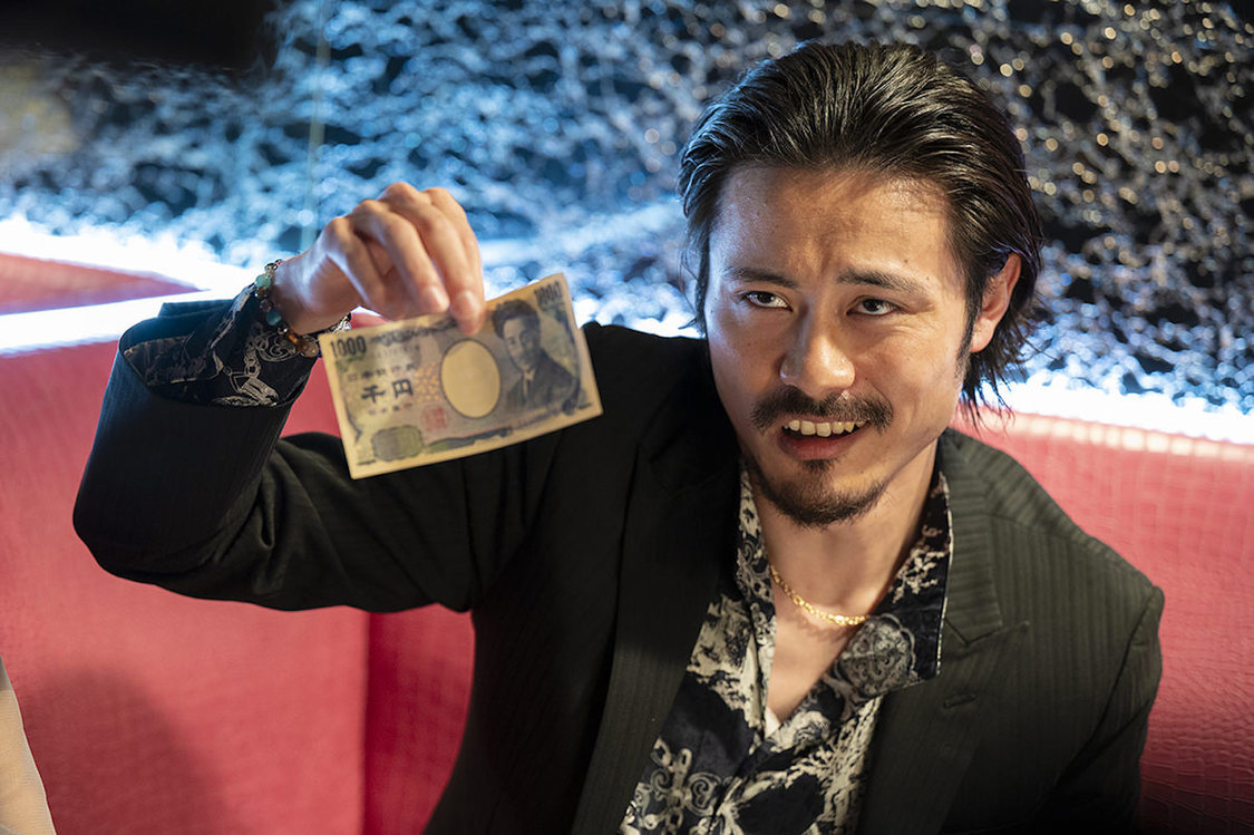 映画『コーヒーはホワイトで』場面写真より（©️映画「コーヒーはホワイトで」製作委員会）